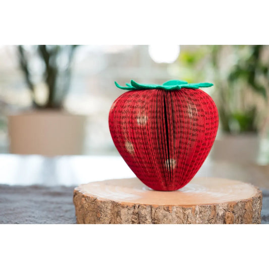 Decorative fruit formed from vintage books